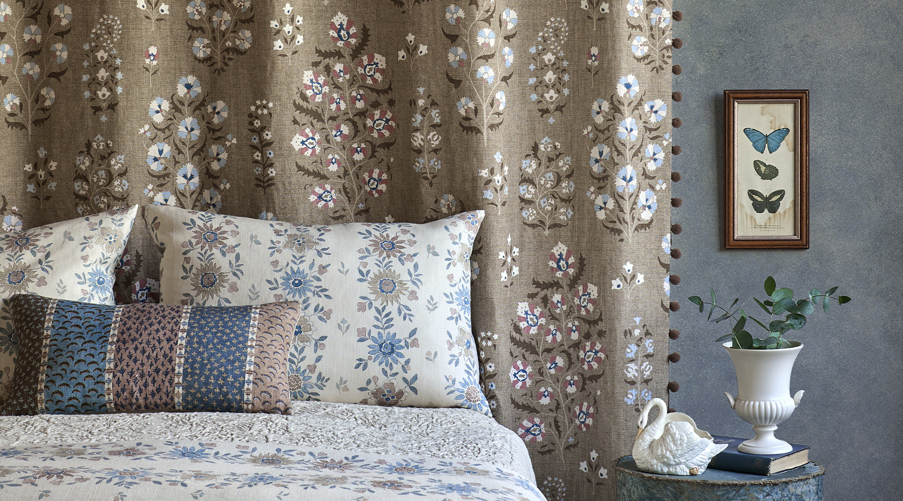 Folkflora floral bedroom with Lara curtain, Freya floral stripe bedding, Asha stripe cushion with Turner's Texture wallpaper